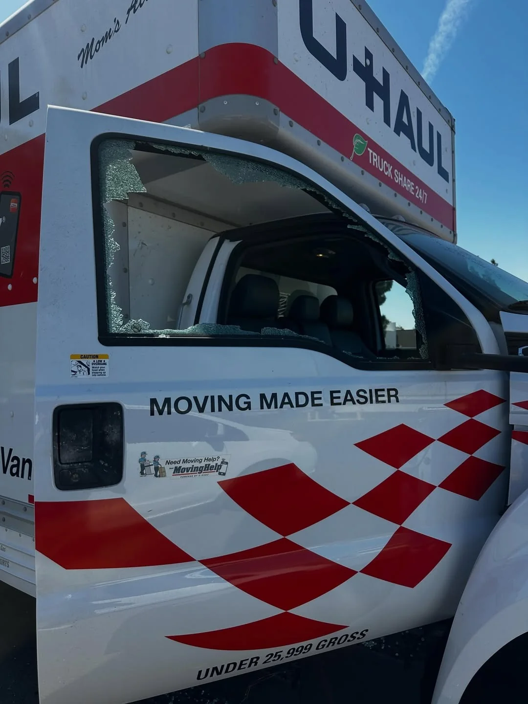 Commercial moving truck with damaged side glass
