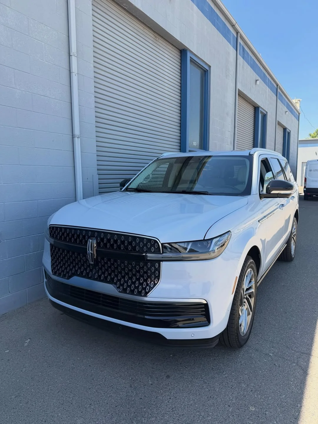 White luxury SUV after windshield service