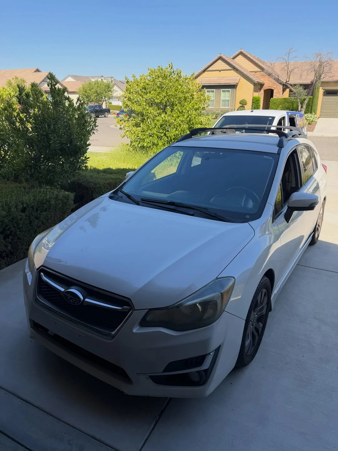 White crossover at a residential appointment
