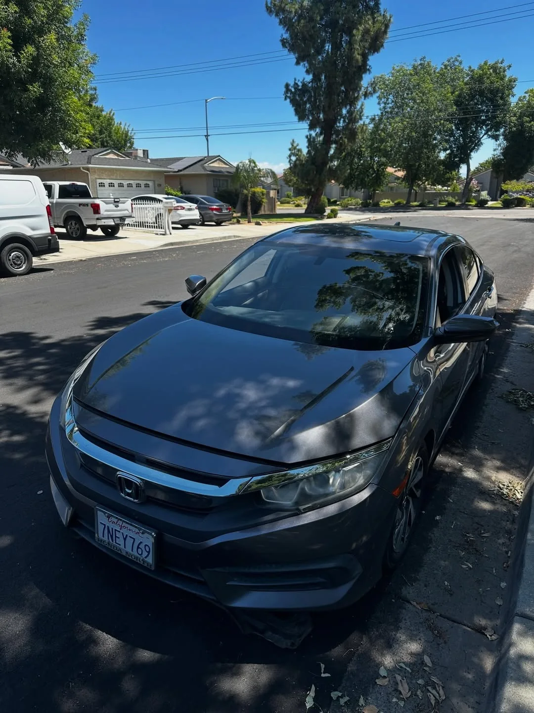 Gray sedan at a neighborhood mobile appointment