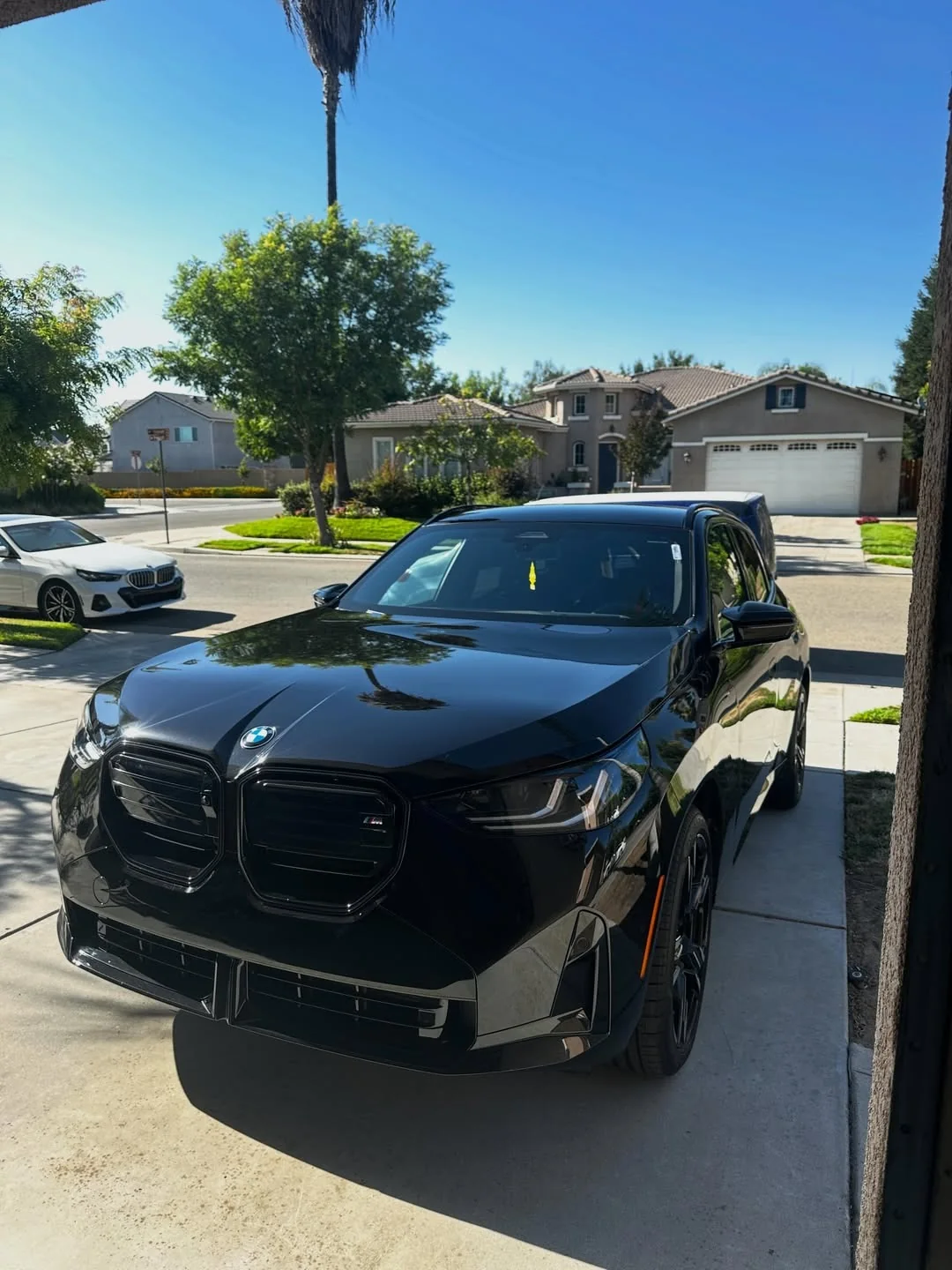 Black luxury SUV after mobile windshield service