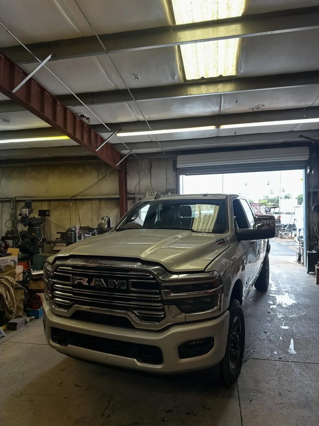 Ram pickup in the shop bay during windshield replacement